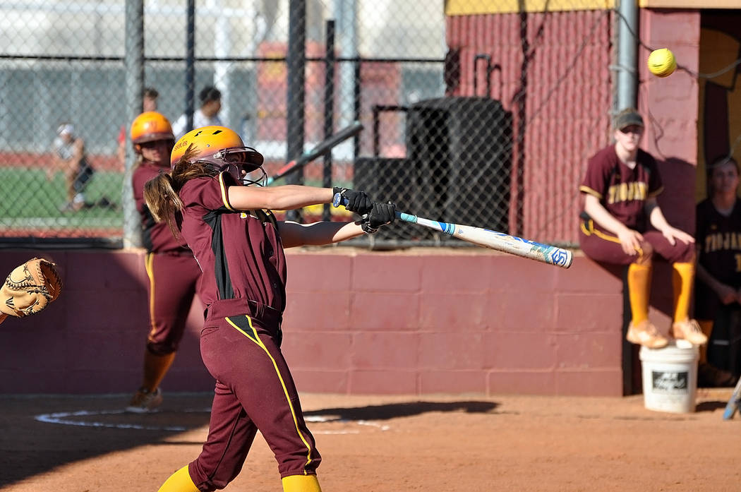 Fresh Skyler Lauver blasts the ball into the outfield for the Trojans. Horace Langford Jr. / Pahrump Valley Times