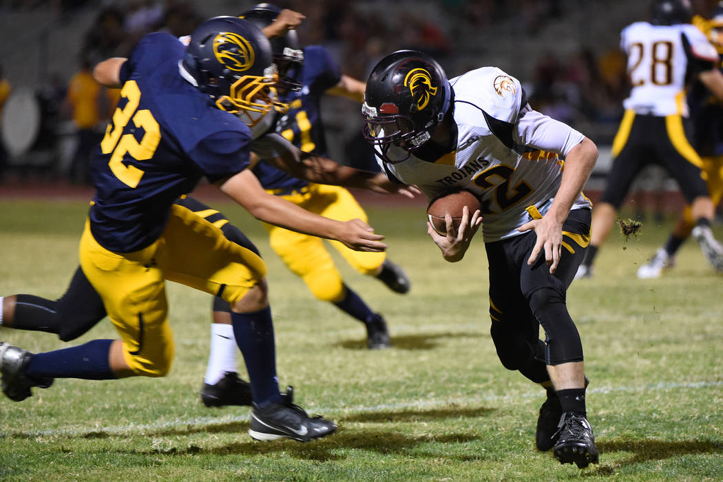 Devlin Dillon is seen running with the ball against Boulder City in 2015. The brothers will play football together next season. Peter Davis / Special to the Pahrump Valley Times