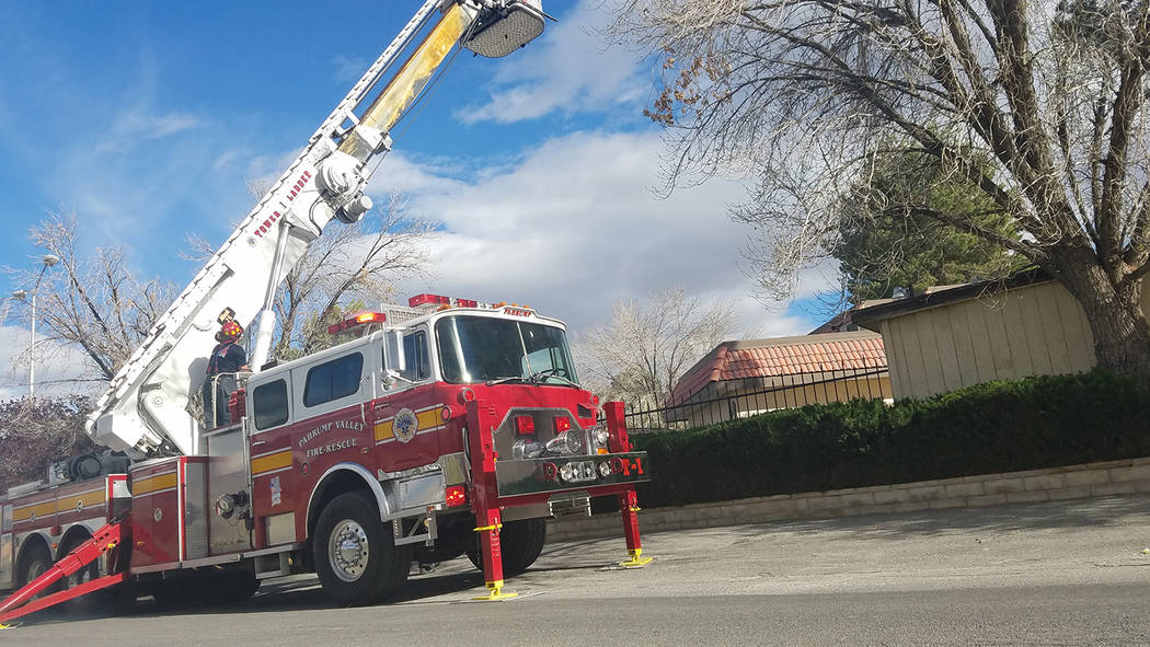 David Jacobs/Pahrump Valley Times
Fire ladder truck at work  outside the apartment that burned off Bourbon Street in Pahrump on March 31. No one was injured in the fire that remains under investig ...