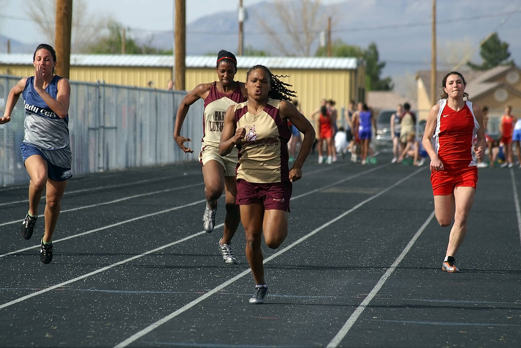 Horace Langford Jr. / Pahrump Valley Times 
Dominique Maloy in action in 2005, winning the 100-meter dash.