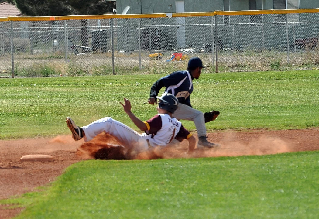 Horace Langford Jr. / Pahrump Valley Times 
Garrett Lucas taking stealing second base. Trojans coach Brian Hayes played small ball against Cheyenne, moving his runners into scoring position whenev ...