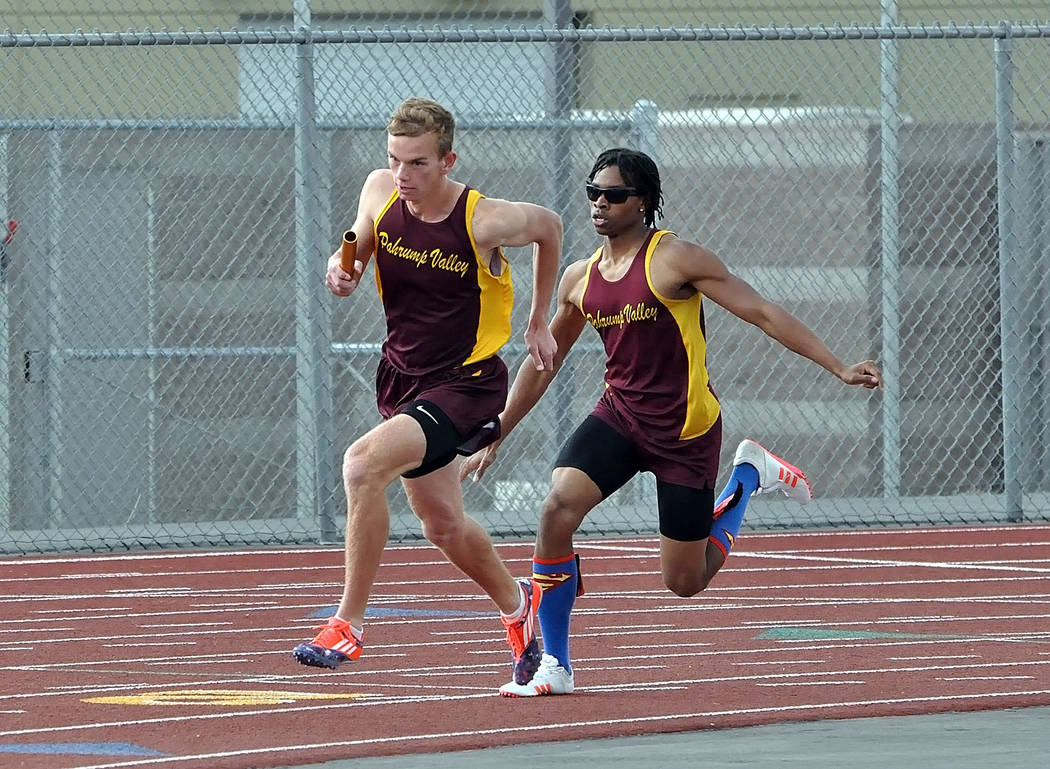Horace Langford Jr. / Pahrump Valley Times

Senior Dylan Montgomery hands the baton off to his teammate, junior Layron Sonerholm, in the 4x800-meter relay on April 6 at Pahrump Valley High School. ...