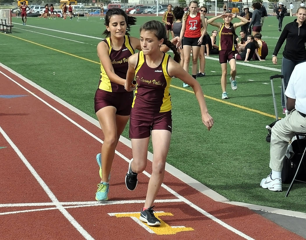 Horace Langford Jr. / Pahrump Valley Times

Senior Alicia Quiroz hands off to junior Grace Plumb in the 4x800-meter relay on April 6. The girls took first in that event and the team is composed of ...