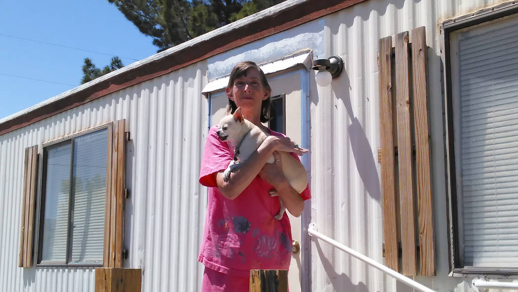 Selwyn Harris/Pahrump Valley Times 
Comstock Park resident Valerie Shaw said she’s taking active steps to keep her animal out of harm’s way after a series of dog poisonings last week. The Nye  ...