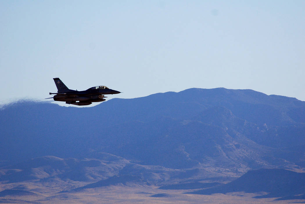 Photo by John Salois
An F-16C makes a pass over Nevada’s Tonopah Test Range after a March test of a mock nuclear weapon as part of a Sandia National Laboratories life extension program for the B ...