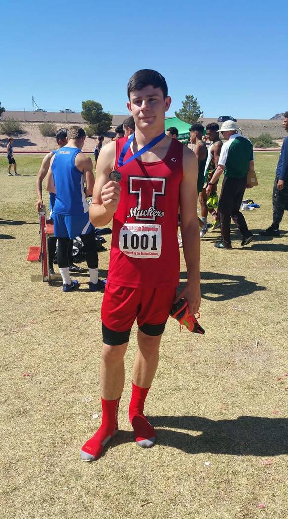 Special to the Pahrump Valley Times

Tyler Kirkland displays his championship high jump medal. On May 20, he cleared 6 feet at the Class 3A Nevada Track and Field Championships at Foothill High Sc ...