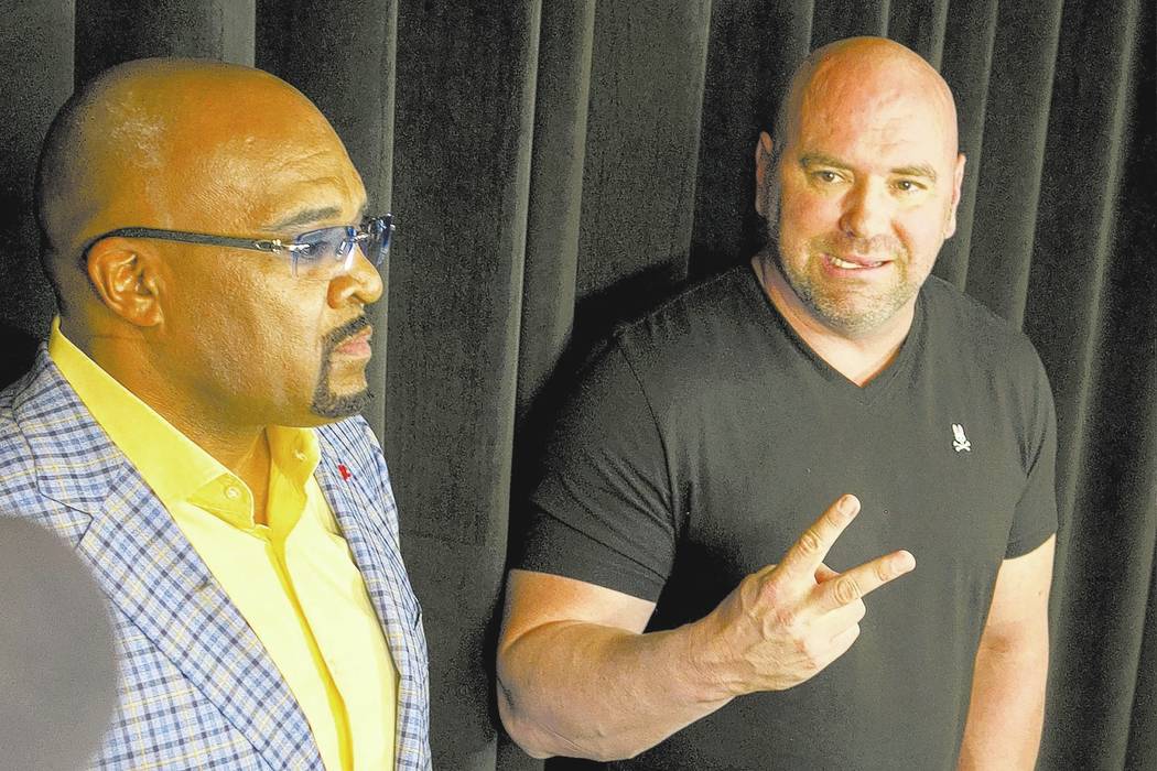 CEO of Mayweather Promotions Leonard Ellerbe, left, and UFC president Dana White, right, announce a Floyd Mayweather Jr. and Conor McGregor fight on Wednesday, June 14, 2017 in Las Vegas. The flig ...