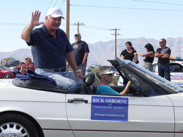 Pahrump Valley Times file photo
This 2014 file photo shows former Nye County Manager Rick Osborne riding in a car during the Fall Festival parade that year.