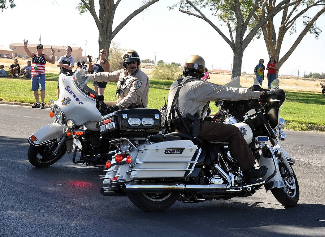 Horace Langford Jr./Pahrump Valley Times- 4th of July parade, NCSO motor officers perform