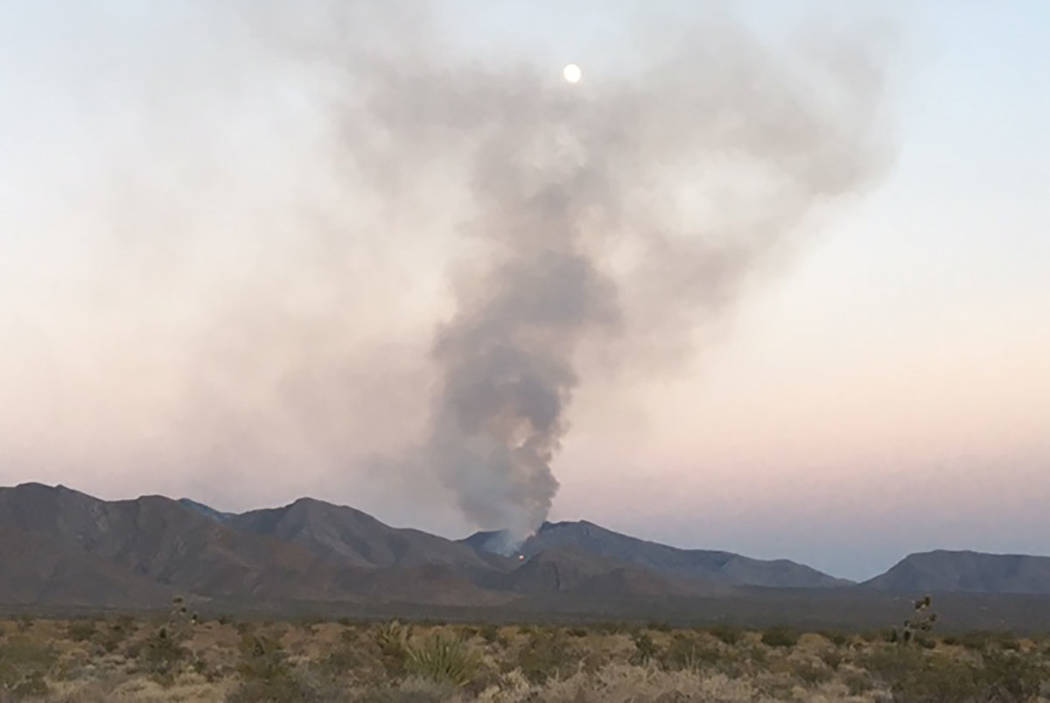 A wildfire burns on the Pahrump side of Potosi Mountain (Larry Haydu/Clark County)