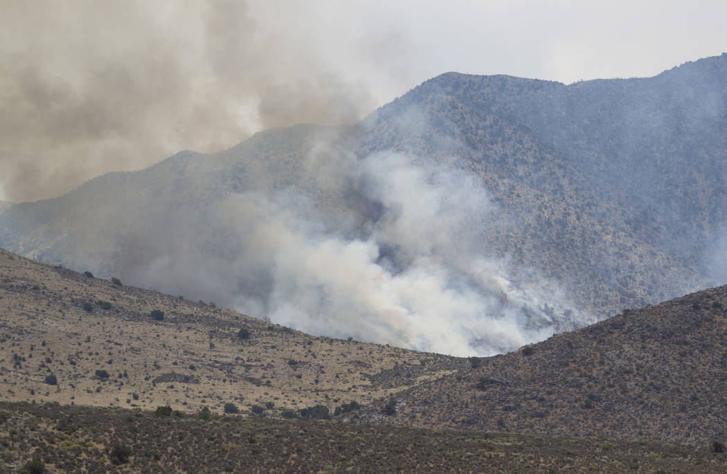 A wildfire burning on the Pahrump side of Mount Potosi southwest of Las Vegas on Friday, July 7, 2017.  (Richard Brian/Las Vegas Review-Journal) @vegasphotograph