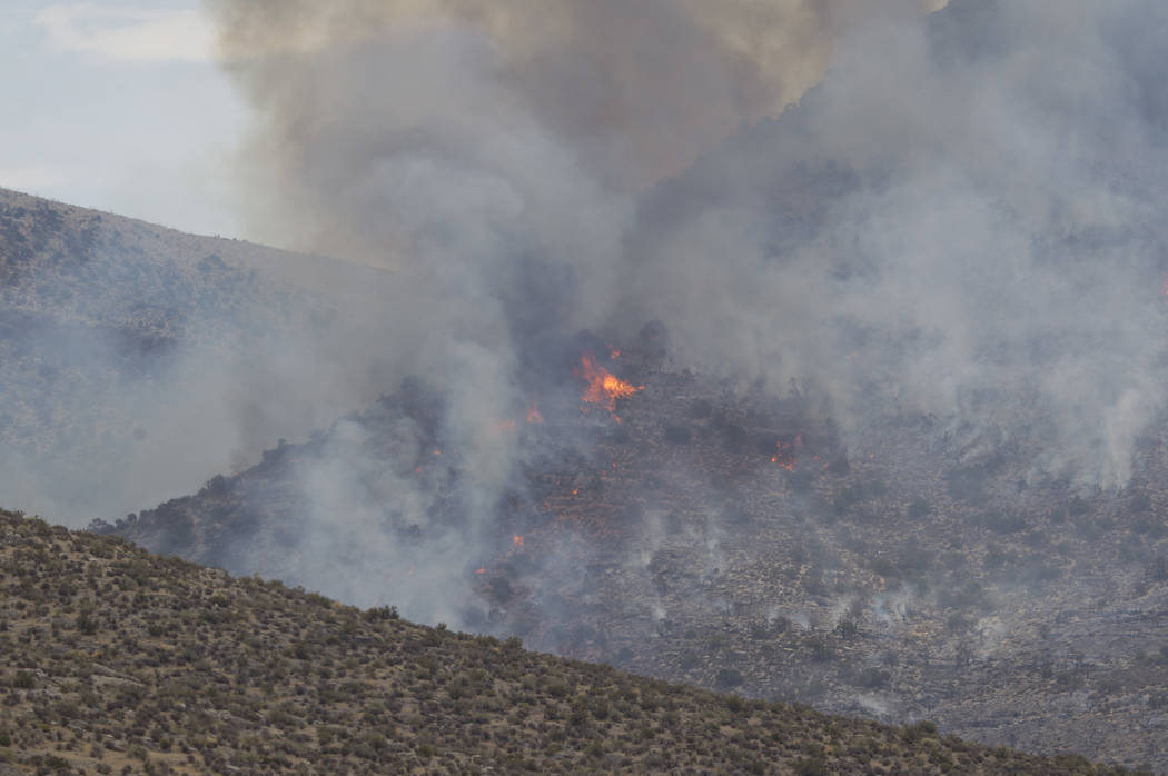 A wildfire burning on the Pahrump side of Mount Potosi southwest of Las Vegas on Friday, July 7, 2017.  (Richard Brian/Las Vegas Review-Journal) @vegasphotograph