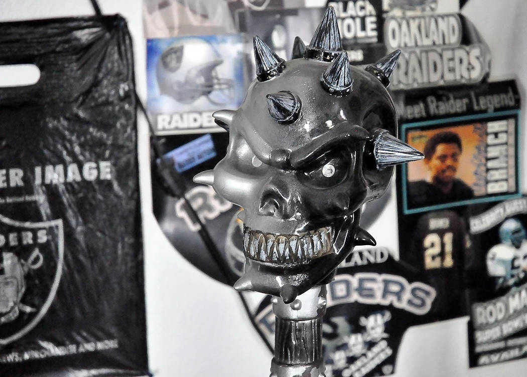 Horace Langford Jr./Pahrump Valley Times -  "Raider Rob" displays a Raider's mask in his house. He also hand makes Raider helmets to sell for Raider fans to wear at games. As far as how much Raide ...