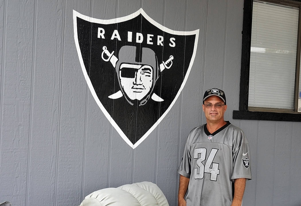 Horace Langford Jr./Pahrump Valley Times -  "Raider Rob" hand painted this logo himself, which adorns the front of his house. Inside the home, every inch of wall space is covered in Raider's memor ...