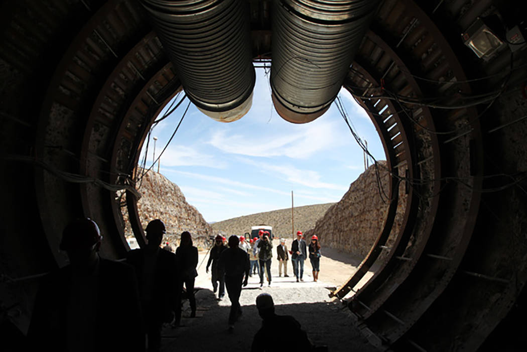 Sam Morris/Las Vegas Review-Journal
Members of a congressional tour of the Yucca Mountain exploratory tunnel enter the south portal, April 9, 2015.  Last week, U.S. Sens. Dean Heller, R-Nevada and ...