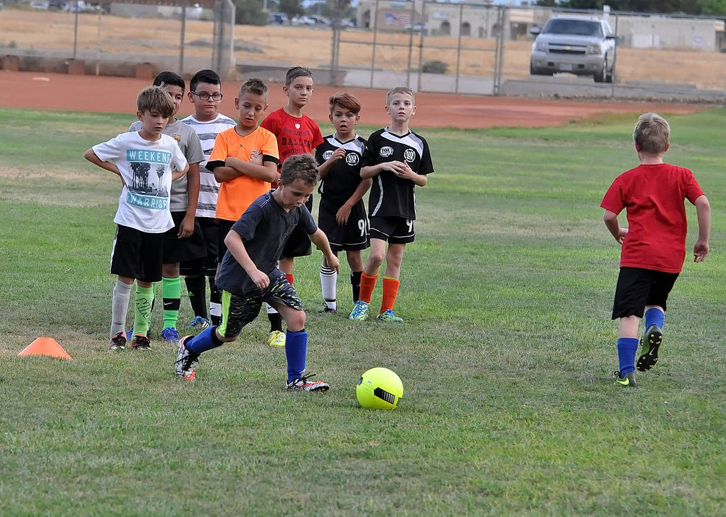 Horace Langford Jr./Pahrump Valley Times

Boys from a club team participate in a free clinic at Ian Deutch Park last Thursday. Club soccer has exploded in Pahrump. The valley now has six teams and ...