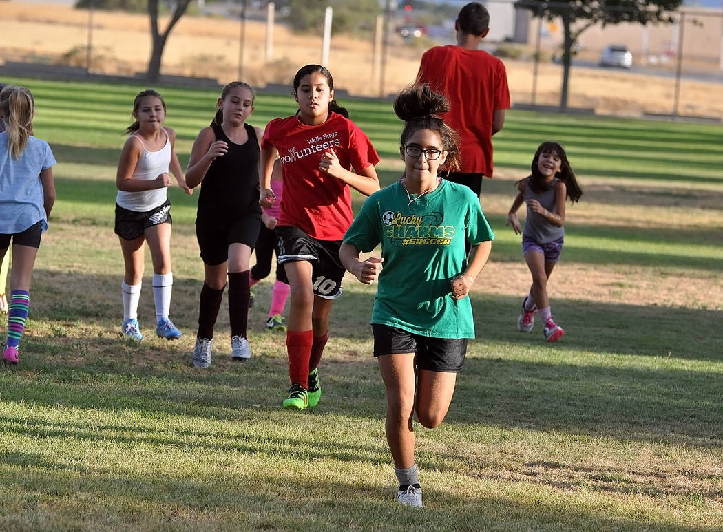 Horace Langford Jr./Pahrump Valley Times

Soccer players, some football players and even basketball players come to the park for three weeks to get ready for fall sports or just to keep in shape.  ...
