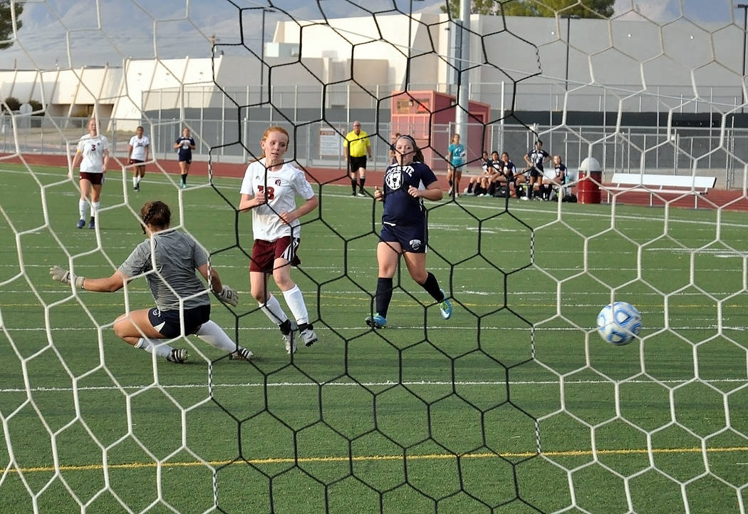 Freshman Makayla Gent scores a goal against Somerset-Sky Pointe in the second half. She also had two assists in the first half of the game.