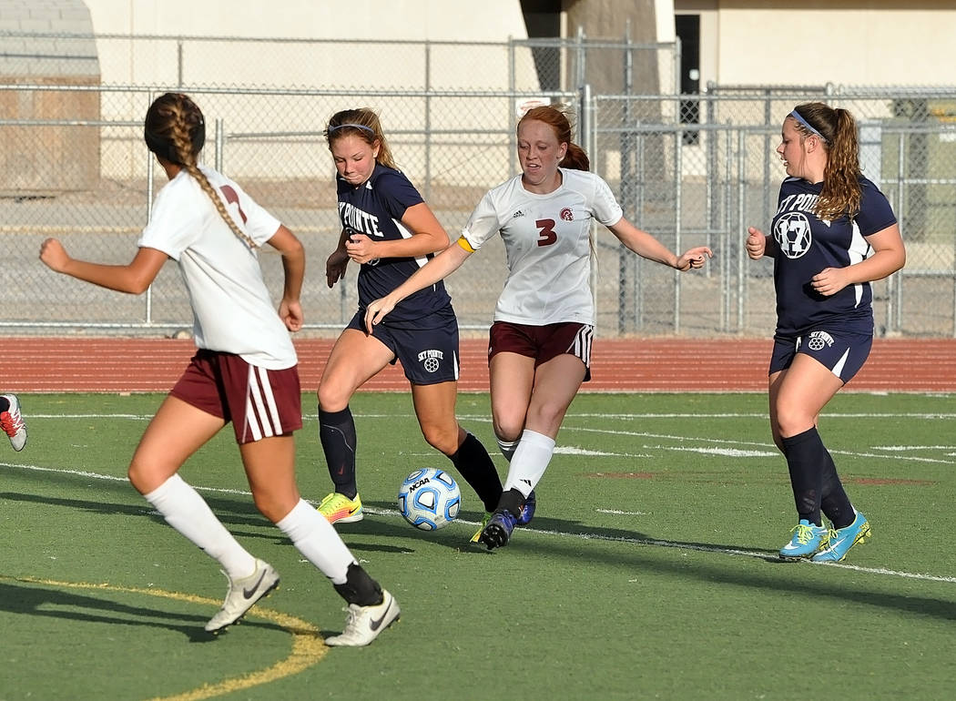 Horace Langford Jr./Pahrump Valley Times
Senior Kaitlyn Carrington passes the ball during the Monday girls soccer opener vs. Somerset-Sky Pointe Academy. Carrington scored two goals in the first h ...