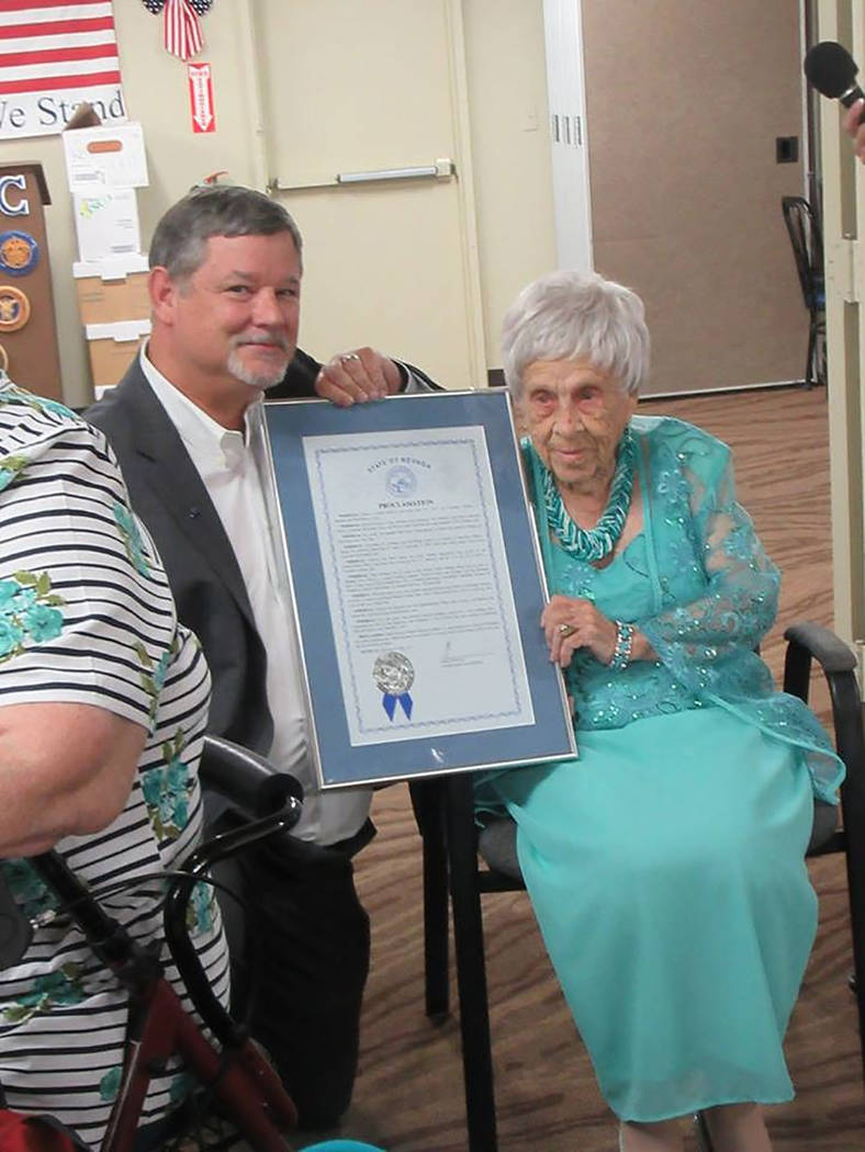 Special to the Pahrump Valley Times 
Nevada District 36 Assemblyman James Oscarson James Oscarson presents a proclamation to Geneva Dulaney during a 100th birthday celebration on July 24. Dulany w ...