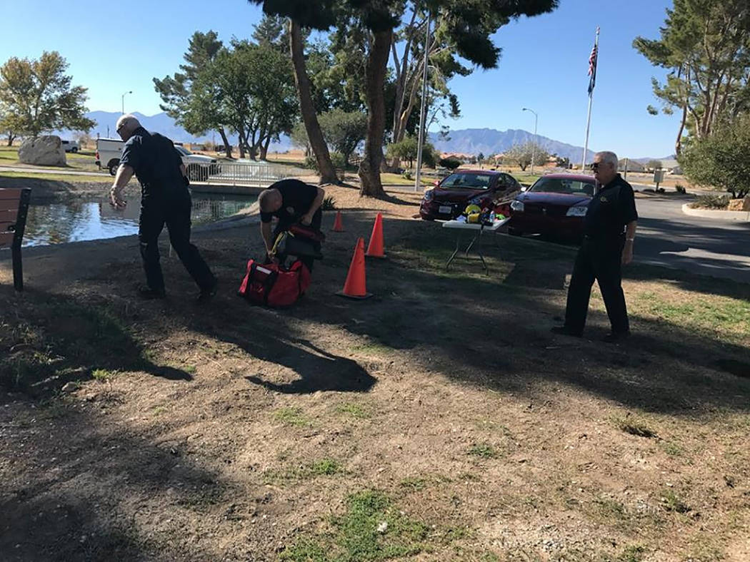 Special to the Pahrump Valley Times 
Members of Nye County Technical Response prepare for a water rescue training drill at the Calvada Eye. Volunteer firefighter classes begin in January, as the n ...