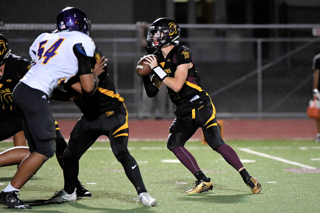 Peter Davis/Special to the Pahrump Valley Times
Dylan Coffman sees Cory Bergman wide open just before he throws him a 12-yard pass in the end zone. This TD made the score 19-13 in the third quarter.