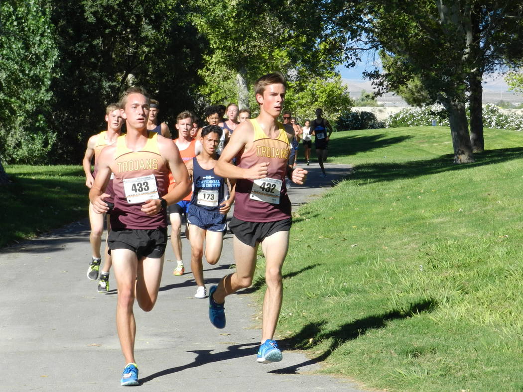 Special to the Pahrump Valley Times
Grant Odegard and Cole Goodman run side by side on Saturday at the Red Rock Invitational, the first meet of the season for the boys and girls cross-country teams.