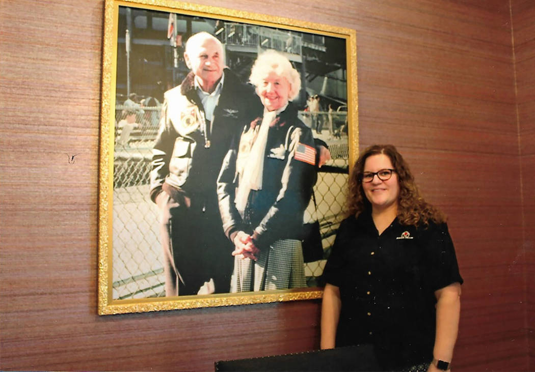 Chuck Baker/Special to the Pahrump Valley Times
Cadie Franco, manager of the Southern Nevada Fisher House, poses in front of a portrait of founders Zachary and Elizabeth Fisher.