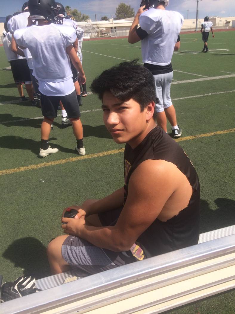 Vern Hee/ Pahrump Valley Times
Sophomore linebacker Anthony Peralta heals up from a game-related injury while watching his teammates practice on Monday. He said he should be back on the field for  ...