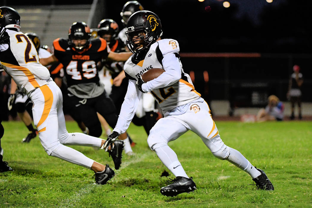 Peter Davis/Special to the Pahrump Valley Times

Nickolas Redmond looks for daylight against Chaparral last week. To beat Rancho, the Trojans need to find that daylight in a big way. The Pahrump r ...