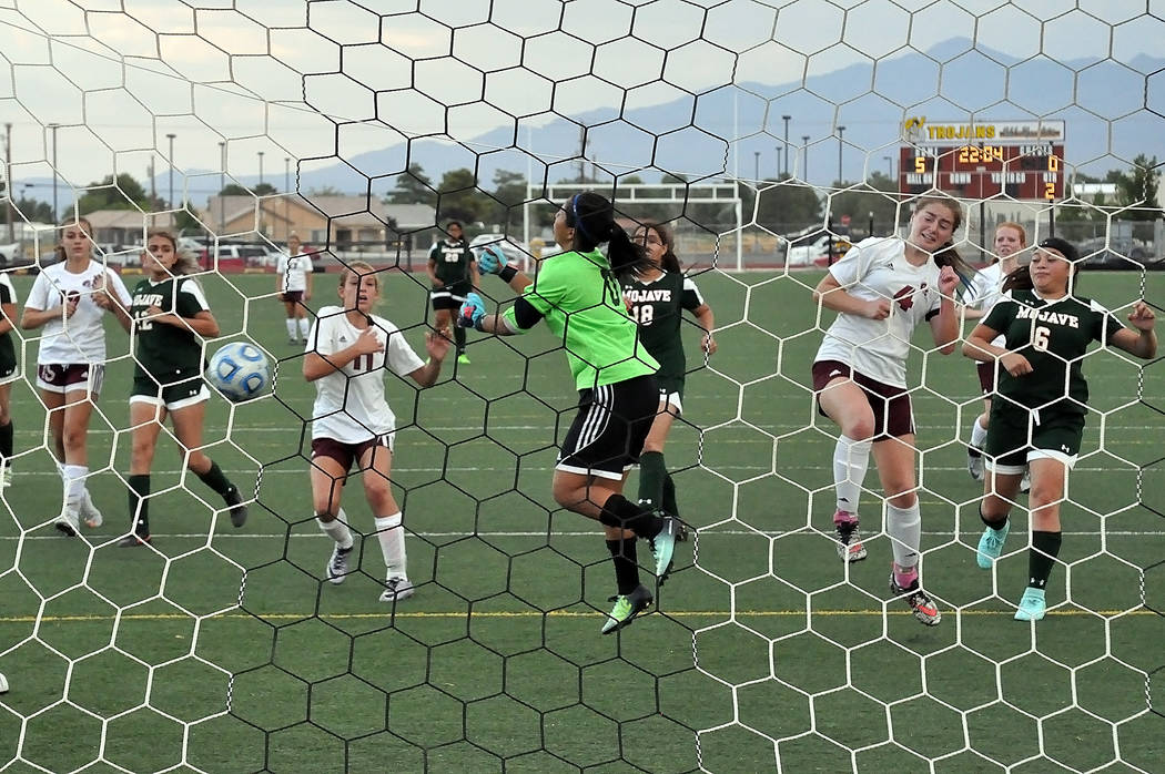 Horace Langford Jr./Pahrump Valley Times

Freshman Madelyn Souza scores the first goal of the second half with an assist by freshman Makayla Gent. She made the score 3-0. The Trojans won the game  ...