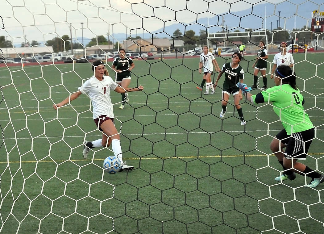 Horace Langford Jr./Pahrump Valley Times

Vaniah Vitto scores one of three for the night against Mojave. Vitto started the scoring against Mojave with her first goal 17 minutes into the game in th ...