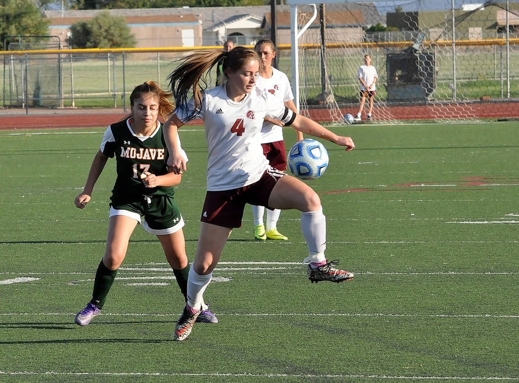 Horace Langford Jr./Pahrump Valley Times

Senior Kathy Niles makes a great midair stop for the Trojans during the Mojave game. Niles had one assist and numerous shots on the goal on Wednesday.