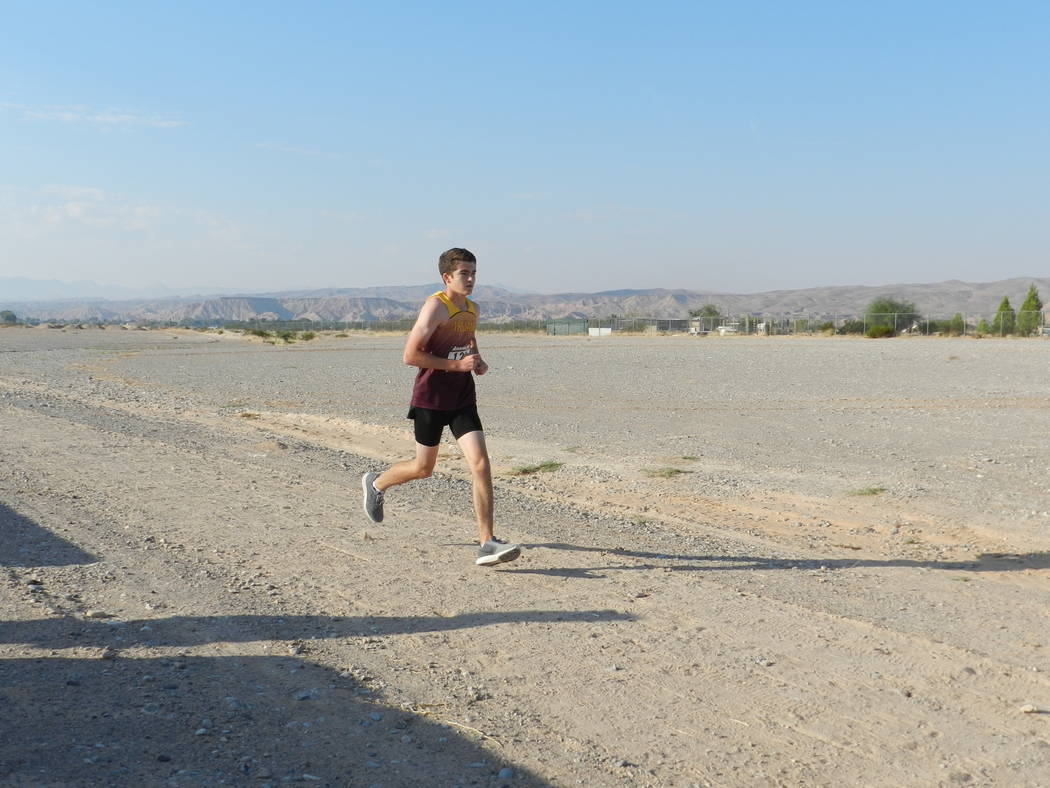 Special to the Pahrump Valley Times

Senior Craig Moore for the boys team toughs it out at the Moapa Valley invite. Moore was 26th out of 46.
Senior Craig Moore for the boys team toughs it out at  ...