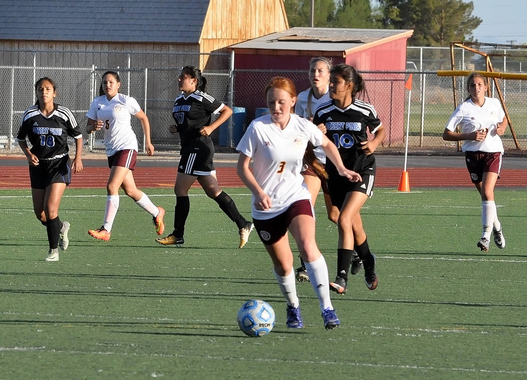 Horace Langford Jr./Pahrump Valley Times

Kaitlyn Carrington takes the ball downfield for Pahrump Valley. She led the team with five goals in that game against Desert Pines.