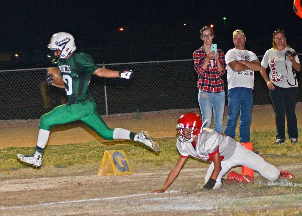 Richard Stephens/Pahrump Valley Times

Sophomore Beatty running back Fabian Perez scores a TD against Tonopah last Friday. Perez had 18 carries for 137 yards and he scored two TDs.