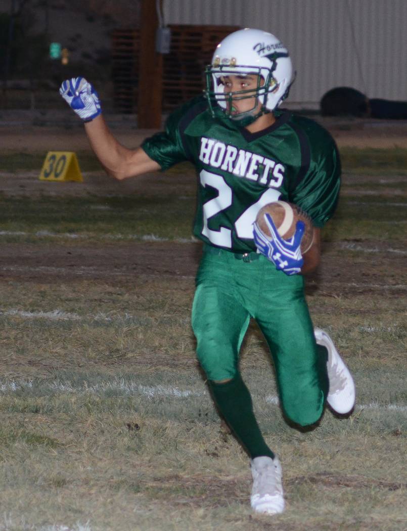 Richard Stephens/Pahrump Valley Times

Yadir Rodriguez runs the ball down the field for Beatty. He had a big night with 110 yards rushing.