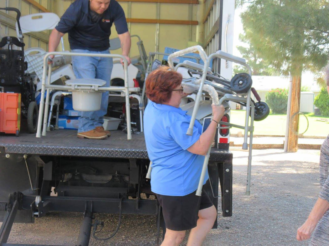 Selwyn Harris/Pahrump Valley Times 
LaaRee Drawantz, Director of Assisted Technology for Easterseals Nevada, unloads a walker and numerous other supplies at the Pahrump Senior Center last Friday.  ...