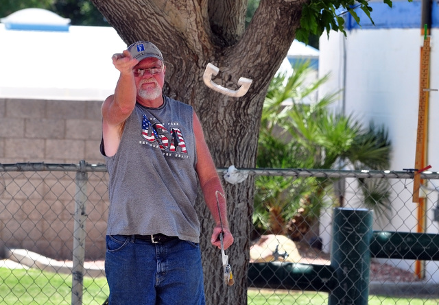 Horace Langford Jr / Pahrump Valley Times 

Don Brown puts a flip on a horseshoe in Petrack Park. The horeshoe pits at Petrack Park are by the pool and are a fun place to learn the game of horsesh ...