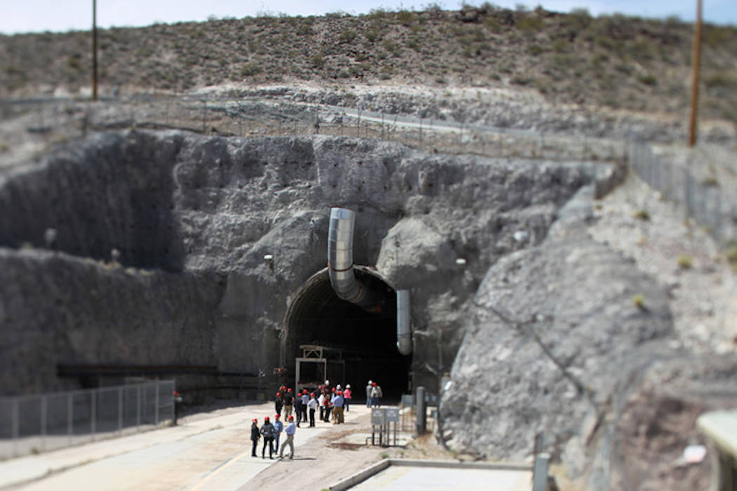 Sam Morris/Las Vegas Review-Journal
Congressional staff members, media and Department of Energy employees wait for congressmen to emerge from the north portal during a congressional tour of the Yu ...