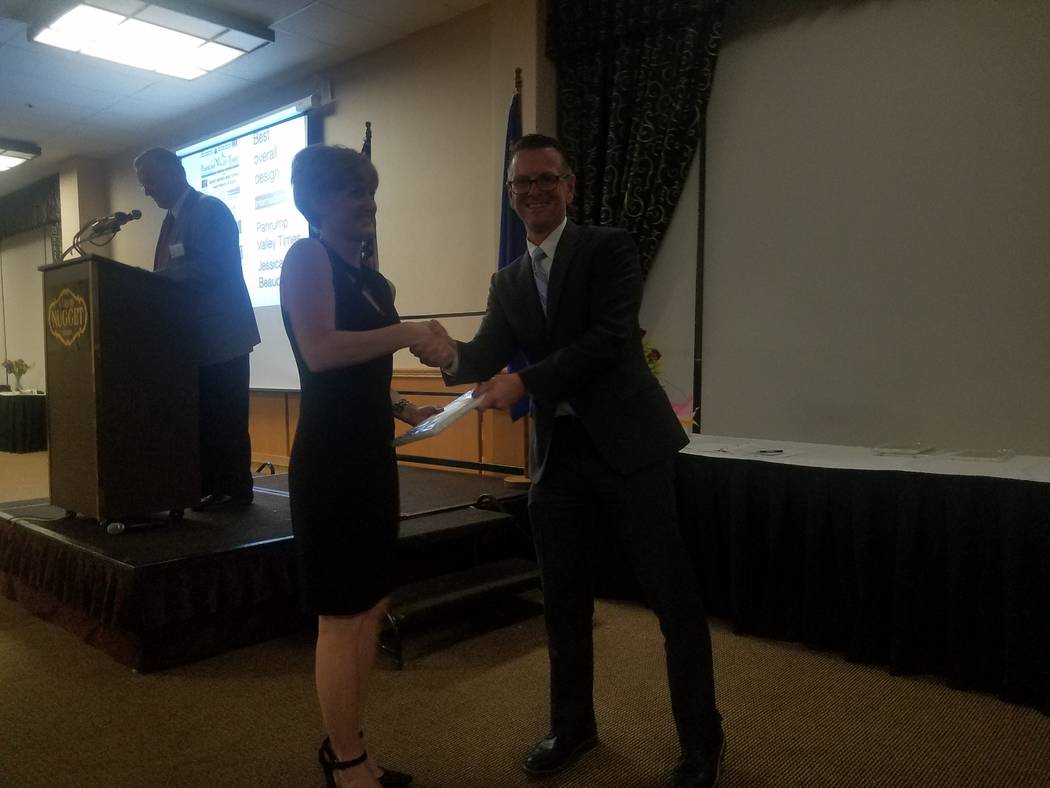 Special to the Pahrump Valley TImes

Jessica Beaudoin, page designer for the Pahrump Valley Times, Tonopah Times-Bonanza and Las Vegas Review-Journal, is honored with a first place award by Ric An ...
