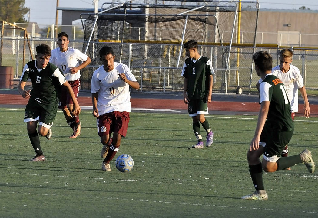 Horace Langford Jr./Pahrump Valley Times

Junior Christian Gonzalez takes the ball downfield for Pahrump. In the second half of the game, the Trojans dominated time of possession.