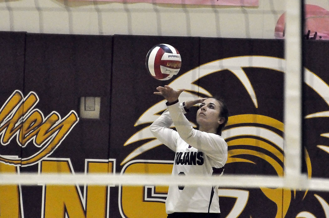 Horace Langford Jr./Pahrump Valley Times

Virginia Weir concentrates on her serve against Cheyenne. Trojans defeat the Desert Shields in three sets and advance as the number one seed in the playoffs.
