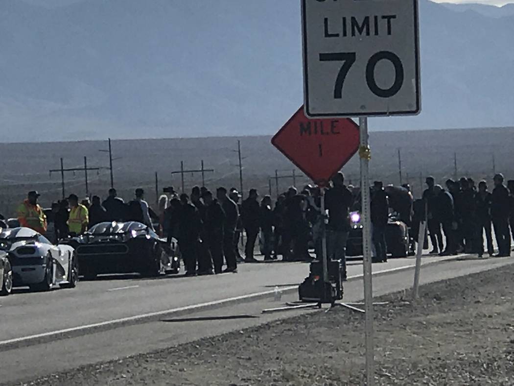 Jeffrey Meehan/Pahrump Valley Times
Spectators and crew ready for a Koenigsegg Agera RS to make its run for speed history along an 11-mile stretch of Highway 160, between the Tecopa turnoff and Mo ...