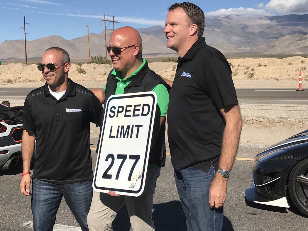 Jeffrey Meehan/Pahrump Valley Times
Christian von Koenigsegg (center), CEO and founder of Koenigsegg, a Swedish car maker, stands with two unidentified Michelin representatives at his company's re ...