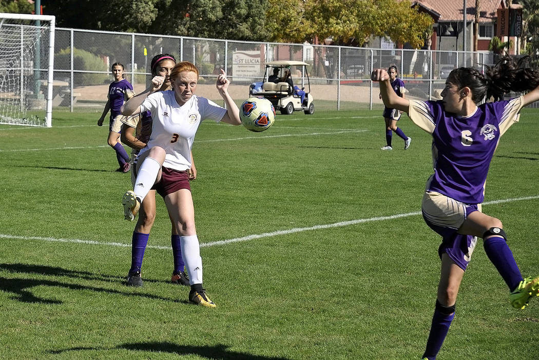Horace Langford Jr./Pahrump Valley Times -  Kaitlyn Carrington receives a pass during the regional championship on Friday
