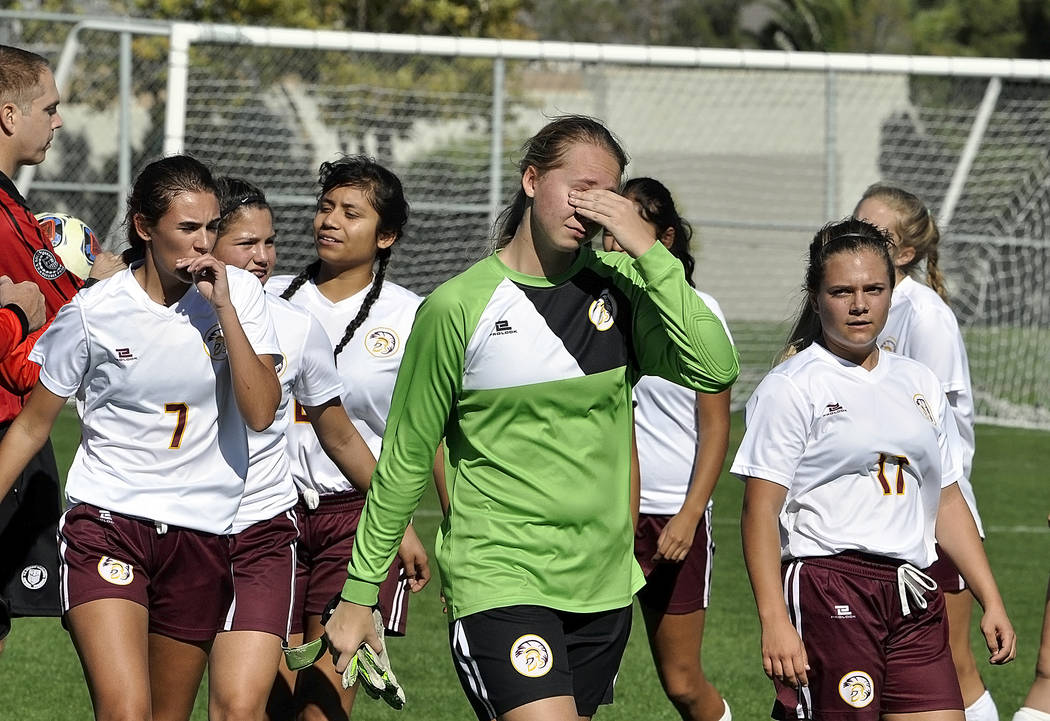 Horace Langford Jr./Pahrump Valley Times
The Pahrump girls are not used to losing. Alyvia Brisco shows emotion at the close of the game after losing to Sunrise Mountain at the regional championshi ...