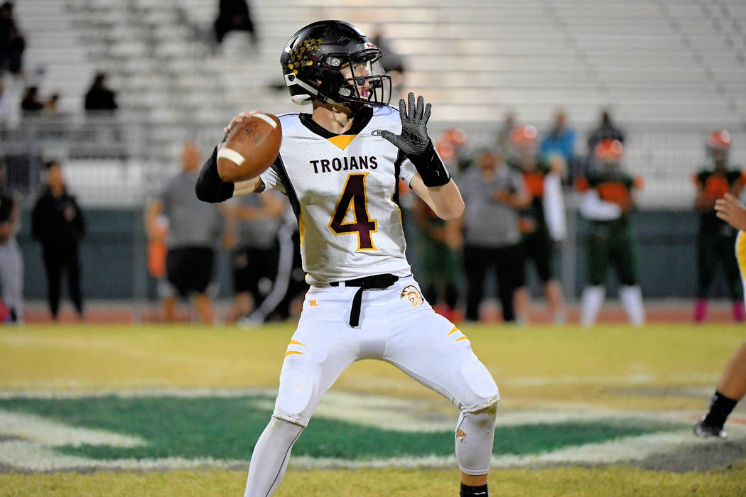 Peter Davis/Special to the Pahrump Valley Times
Senior Dylan Coffman drops back to pass against Mojave. He will be moving on, but the Trojans have junior Tyler Floyd, who has come in for Coffman t ...