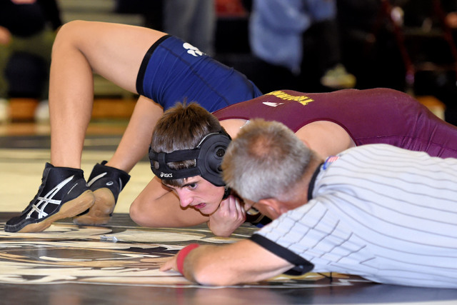 Peter Davis / Special to the Pahrump Valley Times
Tristan Maughan takes his opponent down on Saturday at the Spring Valley Duals. The Trojans didn't win any matches out of four, but were close and ...