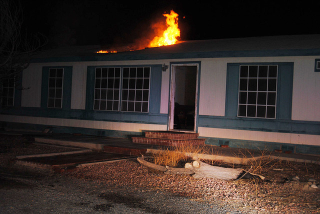A Pahrump man was arrested after his home caught on fire and fire officials discovered an alleged marijuana grow house which had nearly 200 plants inside. 
Special to the Pahrump Valley Times